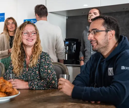 Nexton Consulting employees in the headquarters kitchen in Paris